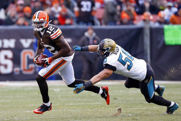 CLEVELAND, OH - DECEMBER 01: Wide receiver Josh Gordon #12 of the Cleveland Browns runs by linebacker Russell Allen #50 of the Jacksonville Jaguars at FirstEnergy Stadium on December 1, 2013 in Cleveland, Ohio. (Photo by Matt Sullivan/Getty Images)