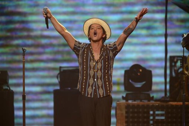 Bruno Mars performs at IHeartRadio Music Festival, day 2, Saturday, Sept. 21, 2013 in Las Vegas, NV. (Photo by Al Powers/Powers Imagery/Invision /AP)