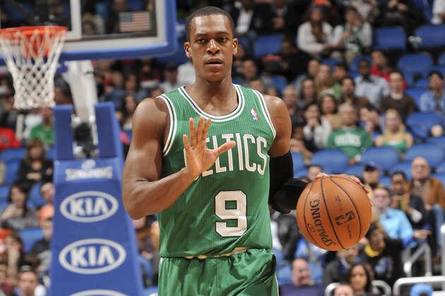 ORLANDO, FL - JANUARY 19: Rajon Rondo #9 of the Boston Celtics dribbles up the court against the Orlando Magic during the game on January 19, 2014 at Amway Center in Orlando, Florida. NOTE TO USER: User expressly acknowledges and agrees that, by downloading and or using this photograph, User is consenting to the terms and conditions of the Getty Images License Agreement. Mandatory Copyright Notice: Copyright 2014 NBAE  (Photo by Fernando Medina/NBAE via Getty Images)