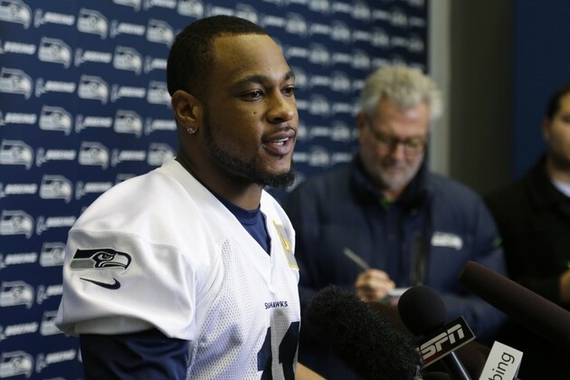 Seattle Seahawks wide receiver Percy Harvin talks to reporters after NFL football practice, Thursday, Jan. 23, 2014, in Renton, Wash. The Seahawks will play the Denver Broncos Feb. 2, 2014 in the Super Bowl. (AP Photo/Ted S. Warren)