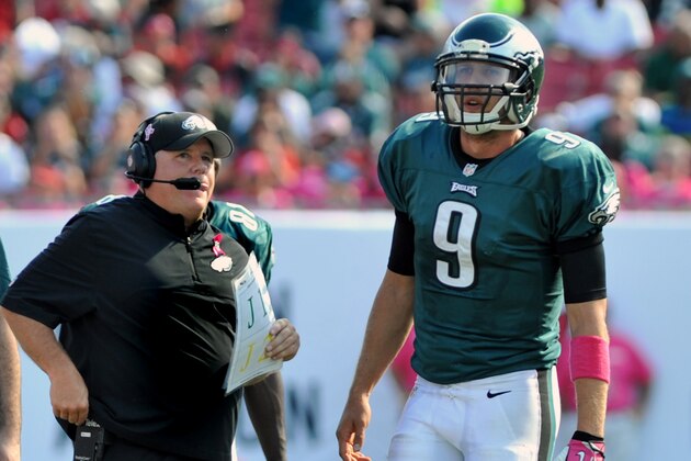 TAMPA, FL - OCTOBER 13: Quarterback Nick Foles #9 of the Philadelphia Eagles talks with coach Chip Kelly as time runs down in the 4th quarter against the Tampa Bay Buccaneers October 13, 2013 at Raymond James Stadium in Tampa, Florida. The Eagles won 31 - 20. (Photo by Al Messerschmidt/Getty Images)
