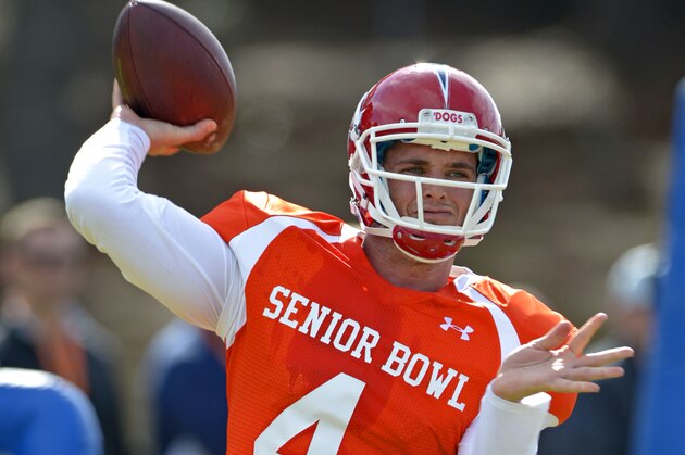 South Squad quarterback Derek Carr of Fresno State (4) throws to a receiver during Senior Bowl practice at Fairhope Municipal Stadium, Monday, Jan. 20, 2014 in Fairhope, Ala. (AP Photo/G.M. Andrews)
