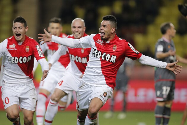Monaco's Emmanuel Riviere of France celebrates after scoring the first goal against Ajaccio  during their French League One soccer match, in Monaco stadium, Sunday, Dec. 8, 2013. (AP Photo/Lionel Cironneau)