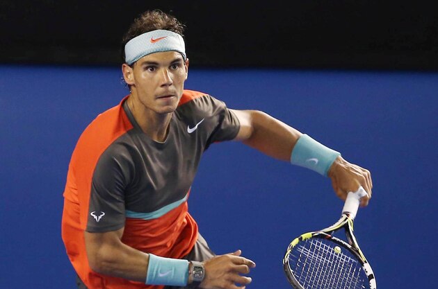 Jan 24, 2014; Melbourne, AUSTRALIA;  Rafael Nadal (ESP) during his match against Roger Federer (SUI) on day twelve of the 2014 Australian Open at Melbourne Park.  Mandatory Credit: Nicolas Luttiau/Presse Sports via USA TODAY Sports
