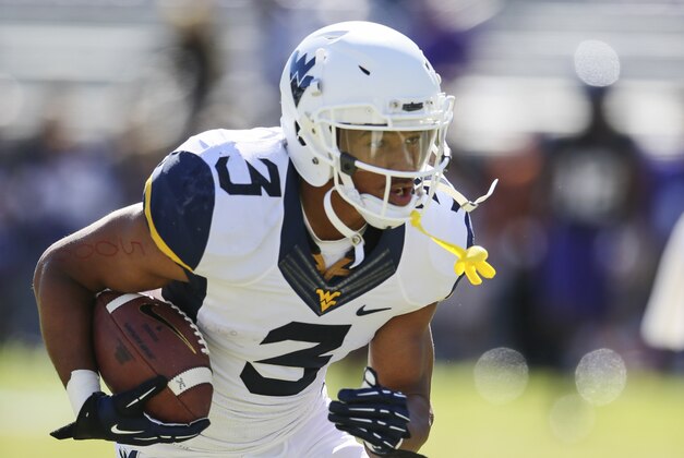 Nov 2, 2013; Fort Worth, TX, USA; West Virginia Mountaineers running back Charles Sims (3) warms up before the game against the TCU Horned Frogs at Amon G. Carter Stadium. Mandatory Credit: Kevin Jairaj-USA TODAY Sports