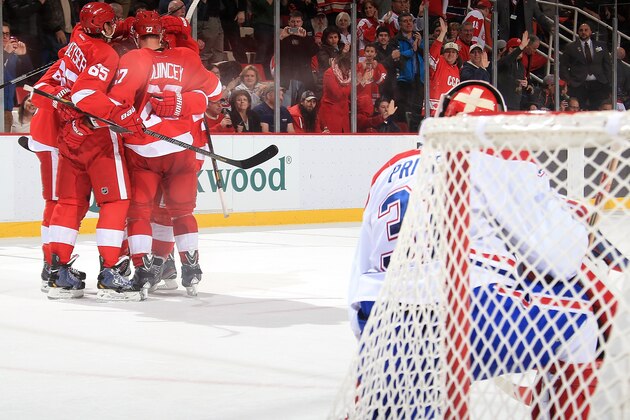 DETROIT, MI - JANUARY 24: Goalie Carey Price #31 of the Montreal Canadiens watches as Danny DeKeyser #65, Kyle Quincey #27, Justin Abdelkader #8 and Henrik Zetterberg #40 of the Detroit Red Wings congratulate teammate Gustav Nyquist #14 on his third-period goal during an NHL game on January 24, 2014 at Joe Louis Arena in Detroit, Michigan. Detroit defeated Montreal 4-1 (Photo by Dave Reginek/NHLI via Getty Images) DETROIT, MI - JANUARY 24: Goalie Carey Price #31 of the Montreal Canadiens watches as Danny DeKeyser #65, Kyle Quincey #27, Justin Abdelkader #8 and Henrik Zetterberg #40 of the Detroit Red Wings congratulate teammate Gustav Nyquist #14 on his third-period goal during an NHL game on January 24, 2014 at Joe Louis Arena in Detroit, Michigan. Detroit defeated Montreal 4-1 (Photo by Dave Reginek/NHLI via Getty Images)