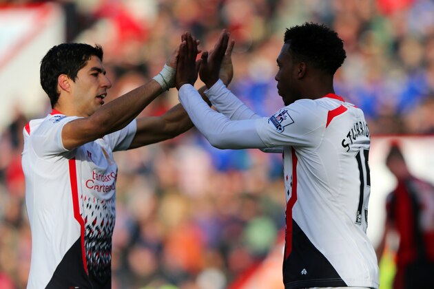 BOURNEMOUTH, ENGLAND - JANUARY 25:  Daniel Sturridge of Liverpool celebrates scoring their second goal with Luis Suarez of Liverpool during the FA Cup Fourth Round match between Bournemouth and Liverpool at Goldsands Stadium on January 25, 2014 in Bournemouth, England.  (Photo by Ian Walton/Getty Images)