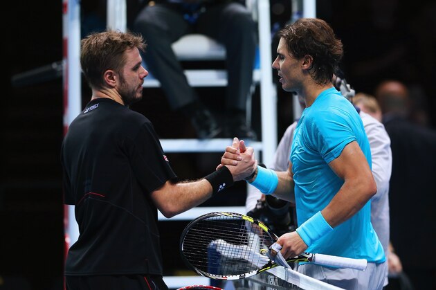 LONDON, ENGLAND - NOVEMBER 06: Rafael Nadal (R) of Spain is congratulated by Stanislas Wawrinka of Switzerland after their men's singles match during day three of the Barclays ATP World Tour Finals at O2 Arena on November 6, 2013 in London, England. (Photo by Clive Brunskill/Getty Images) LONDON, ENGLAND - NOVEMBER 06: Rafael Nadal (R) of Spain is congratulated by Stanislas Wawrinka of Switzerland after their men's singles match during day three of the Barclays ATP World Tour Finals at O2 Arena on November 6, 2013 in London, England. (Photo by Clive Brunskill/Getty Images)