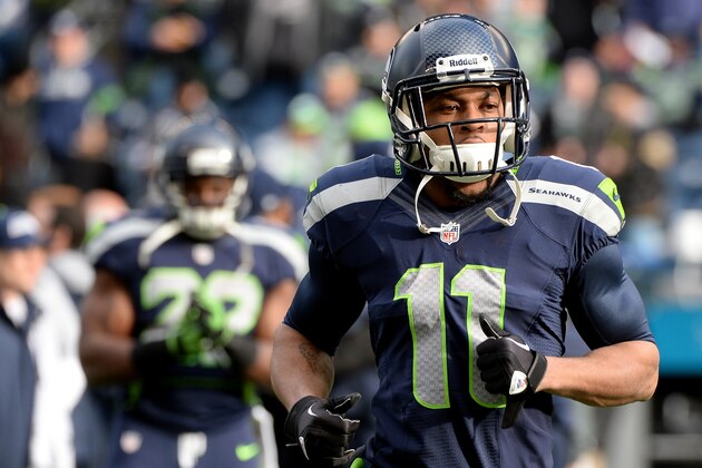 SEATTLE, WA - JANUARY 11:  Wide receiver Percy Harvin #11 of the Seattle Seahawks on the field before taking on the New Orleans Saints on the field during the NFC Divisional Playoff Game at CenturyLink Field on January 11, 2014 in Seattle, Washington.  (Photo by Harry How/Getty Images)