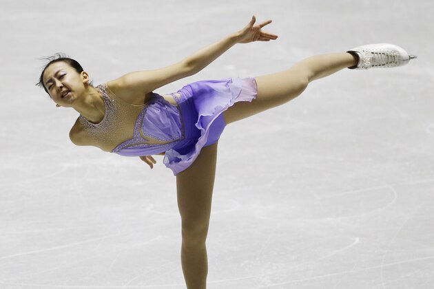 Japan's Mao Asada performs during the ladies short program of the NHK Trophy Figure Skating in Tokyo, Friday, Nov. 8, 2013. (AP Photo/Koji Sasahara)