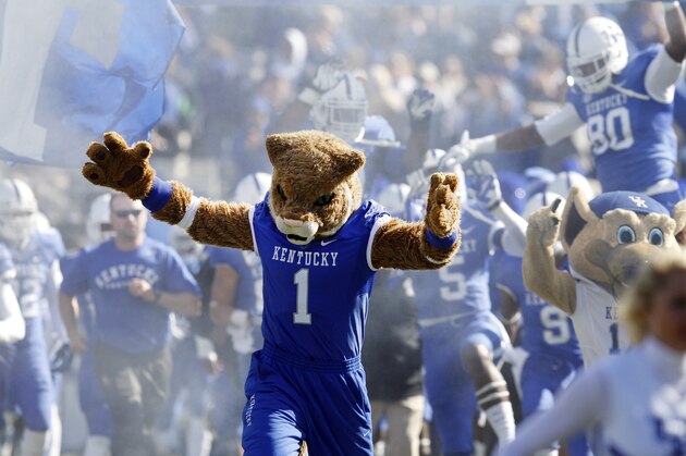 The Kentucky Wildcat mascot leads the team onfield before an NCAA college football game against Missouri, Saturday, Nov. 9, 2013, in Lexington, Ky. (AP Photo/James Crisp)