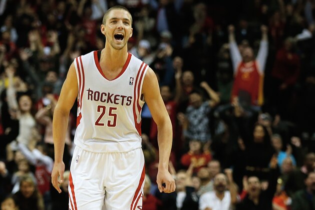 HOUSTON, TX - JANUARY 24:  Chandler Parsons #25 of the Houston Rockets celebrates a three-pointer against the Memphis Grizzlies during the game at the Toyota Center on January 24, 2014 in Houston, Texas. NOTE TO USER: User expressly acknowledges and agrees that, by downloading and or using this photograph, User is consenting to the terms and conditions of the Getty Images License Agreement.  (Photo by Scott Halleran/Getty Images)