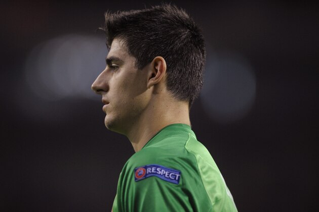 PORTO, PORTUGAL - OCTOBER 1: Thibaut Courtois of Club Atletico de Madrid in action during the UEFA Champions League group stage match between FC Porto and Club Atletico de Madrid held on October 1, 2013 at the Estadio do Dragao, in Porto, Portugal. (Photo by Miguel Riopa/EuroFootball/Getty Images) PORTO, PORTUGAL - OCTOBER 1: Thibaut Courtois of Club Atletico de Madrid in action during the UEFA Champions League group stage match between FC Porto and Club Atletico de Madrid held on October 1, 2013 at the Estadio do Dragao, in Porto, Portugal. (Photo by Miguel Riopa/EuroFootball/Getty Images)