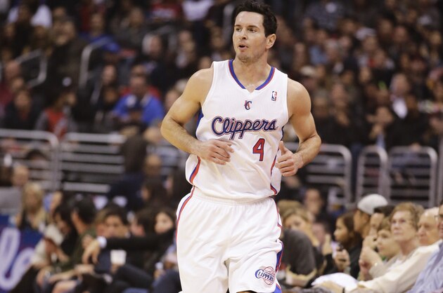 Los Angeles Clippers' J.J. Redick makes his way down the court during the first half of an NBA basketball game against the Brooklyn Nets on Saturday, Nov. 16, 2013, in Los Angeles. (AP Photo/Jae C. Hong)