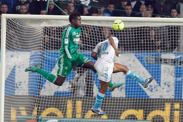 Marseille's Ghanaian forward Andre Ayew, right, scores despite Saint-Etienne's French defender Kurt Zouma, during their League One soccer match, in Marseille, southern France, Sunday, Dec. 23, 2012. (AP Photo/Claude Paris) Marseille's Ghanaian forward Andre Ayew, right, scores despite Saint-Etienne's French defender Kurt Zouma, during their League One soccer match, in Marseille, southern France, Sunday, Dec. 23, 2012. (AP Photo/Claude Paris)