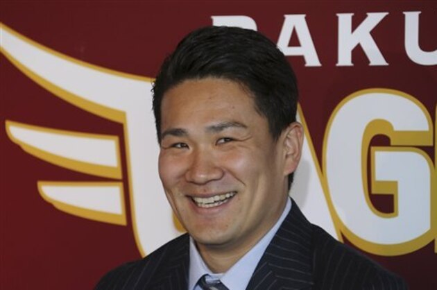 Japanese pitcher Masahiro Tanaka speaks during a press conference at the Rakuten Eagles' stadium in Sendai, northeastern Japan, Thursday, Jan. 23, 2014. The 25-year-old right-hander said he chose to play for the New York Yankees because they appreciated him the most. Speaking after agreeing a $155 million, seven-year deal with the Yankees, Tanaka said