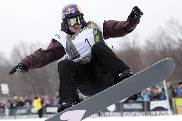 Iouri Podladtchikov of Switzerland races to a second-place finish in the men's half-pipe at the U.S. Open Snowboarding Championships in Stratton, Vt., on Saturday, March 12, 2011. (AP Photo/Mike Groll)