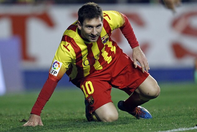 Barcelona's Lionel Messi from Argentina in action during their la Copa del Rey soccer match against Levante at the Ciutat de Valencia stadium in Valencia, Spain, Wednesday Jan. 22, 2014. The Argentinean plays his 400th game in a Barcelona shirt in the Copa del Rey against Levante. (AP Photo/Alberto Saiz) Barcelona's Lionel Messi from Argentina in action during their la Copa del Rey soccer match against Levante at the Ciutat de Valencia stadium in Valencia, Spain, Wednesday Jan. 22, 2014. The Argentinean plays his 400th game in a Barcelona shirt in the Copa del Rey against Levante. (AP Photo/Alberto Saiz)
