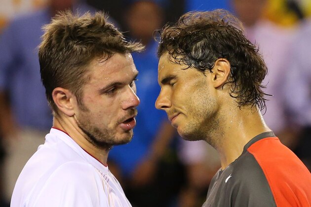 MELBOURNE, AUSTRALIA - JANUARY 26:  Stanislas Wawrinka of Switzerland and Rafael Nadal of Spain hug at the net after Wawrinka won their men's final match during day 14 of the 2014 Australian Open at Melbourne Park on January 26, 2014 in Melbourne, Australia.  (Photo by Scott Barbour/Getty Images)