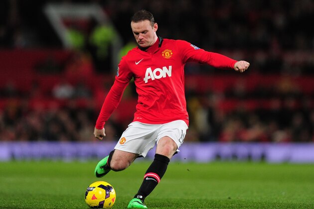 MANCHESTER, ENGLAND - DECEMBER 21:  Wayne Rooney of Manchester United in action during the Barclays Premier League match between Manchester United and West Ham United at Old Trafford on December 21, 2013 in Manchester, England.  (Photo by Stu Forster/Getty Images)