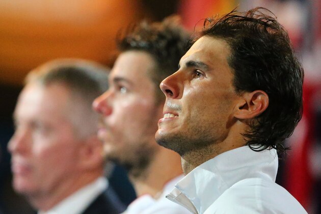 MELBOURNE, AUSTRALIA - JANUARY 26:  Stanislas Wawrinka of Switzerland and Rafael Nadal of Spain looks on at their presentation after Wawrinka won their final match during day 14 of the 2014 Australian Open at Melbourne Park on January 26, 2014 in Melbourne, Australia.  (Photo by Scott Barbour/Getty Images)