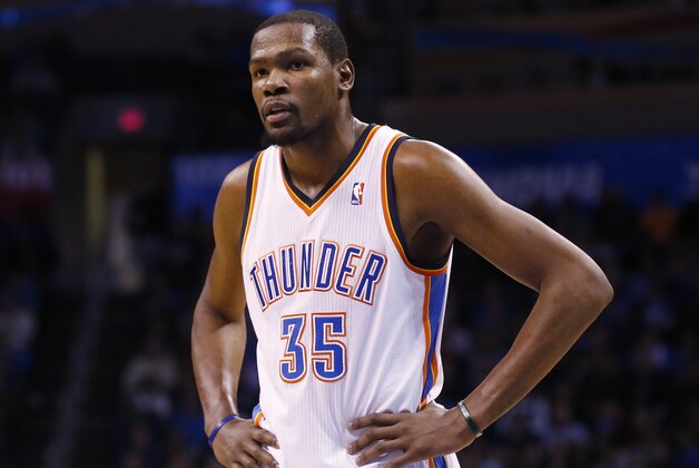 Oklahoma City Thunder forward Kevin Durant (35) waits to take a foul shot in the fourth quarter of an NBA basketball game against the Portland Trail Blazers in Oklahoma City, Tuesday, Jan. 21, 2014. Oklahoma City won 105-97. (AP Photo/Sue Ogrocki)