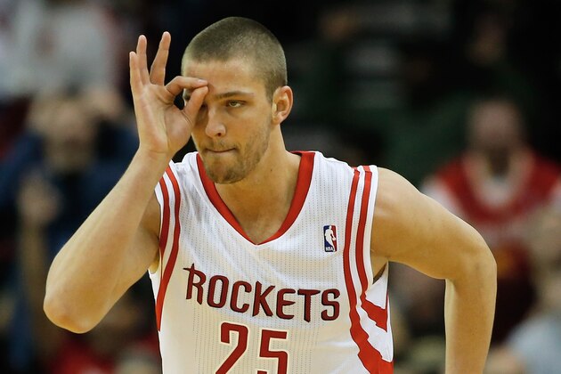 HOUSTON, TX - JANUARY 24:  Chandler Parsons #25 of the Houston Rockets celebrates a three-pointer against the Memphis Grizzlies during the game at the Toyota Center on January 24, 2014 in Houston, Texas. NOTE TO USER: User expressly acknowledges and agrees that, by downloading and or using this photograph, User is consenting to the terms and conditions of the Getty Images License Agreement.  (Photo by Scott Halleran/Getty Images)
