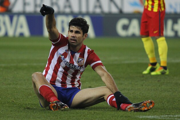 Atletico's Diego Costa gestures during a Spanish La Liga soccer match between Atletico de Madrid and FC Barcelona at the Vicente Calderon stadium in Madrid, Spain, Saturday, Jan. 11, 2014. (AP Photo/Gabriel Pecot)