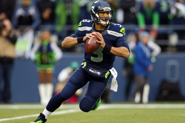 SEATTLE, WA - JANUARY 19:  Quarterback Russell Wilson #3 of the Seattle Seahawks drops back against the San Francisco 49ers during the 2014 NFC Championship at CenturyLink Field on January 19, 2014 in Seattle, Washington.  (Photo by Ronald Martinez/Getty Images)