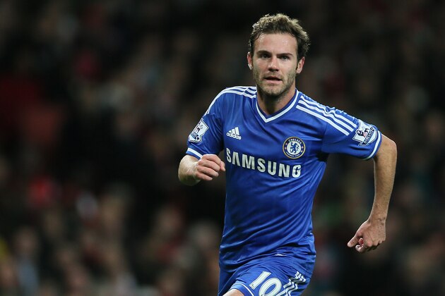 Chelsea's Juan Mata, celebrates after scoring his teams second goal during their English League Cup soccer match between Arsenal and Chelsea at the Emirates stadium in London Tuesday, Oct. 29, 2013. (AP Photo/Alastair Grant)