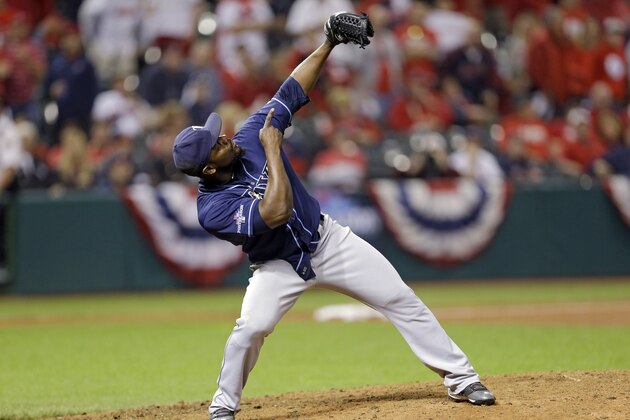 Tampa Bay Rays relief pitcher Fernando Rodney celebrates after the final out in the Rays' 4-0 win over the Cleveland Indians in the AL wild-card baseball game Wednesday, Oct. 2, 2013, in Cleveland. (AP Photo/Tony Dejak)