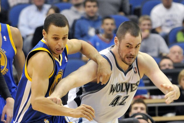 Golden State Warriors' Stephen Curry, left, and Minnesota Timberwolves' Kevin Love race for the ball during the second half of an NBA basketball game, Saturday, Nov. 27, 2010, in Minneapolis. The Warriors won 104-94. Curry scored 20 points for the Warriors and Love had 21 points and 22 rebounds for the Timberwolves. (AP Photo/Jim Mone) Golden State Warriors' Stephen Curry, left, and Minnesota Timberwolves' Kevin Love race for the ball during the second half of an NBA basketball game, Saturday, Nov. 27, 2010, in Minneapolis. The Warriors won 104-94. Curry scored 20 points for the Warriors and Love had 21 points and 22 rebounds for the Timberwolves. (AP Photo/Jim Mone)