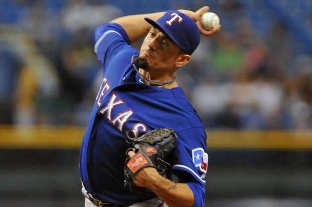 ST. PETERSBURG, FL - SEPTEMBER 16:  Pitcher Matt Garza #22 of the Texas Rangers starts against the Tampa Bay Rays September 16, 2013 at Tropicana Field in St. Petersburg, Florida.  The Rays won 6 - 2. (Photo by Al Messerschmidt/Getty Images)
