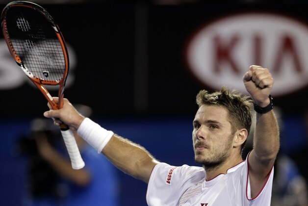 Stanislas Wawrinka of Switzerland celebrates after defeating Rafael Nadal of Spain during the men's singles final at the Australian Open tennis championship in Melbourne, Australia, Sunday, Jan. 26, 2014. (AP Photo/Rick Rycroft)