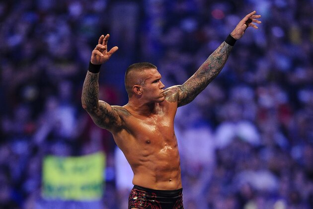 WWE Superstar Randy Orton celebrates defeating CM Punk (not pictured) during WrestleMania XXVII at the Georgia Dome in Atlanta, Georgia on Sunday, April 3, 2011. (Paul Abell/AP Images for WWE)