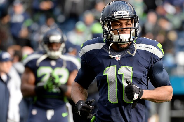 SEATTLE, WA - JANUARY 11:  Wide receiver Percy Harvin #11 of the Seattle Seahawks on the field before taking on the New Orleans Saints on the field during the NFC Divisional Playoff Game at CenturyLink Field on January 11, 2014 in Seattle, Washington.  (Photo by Harry How/Getty Images)