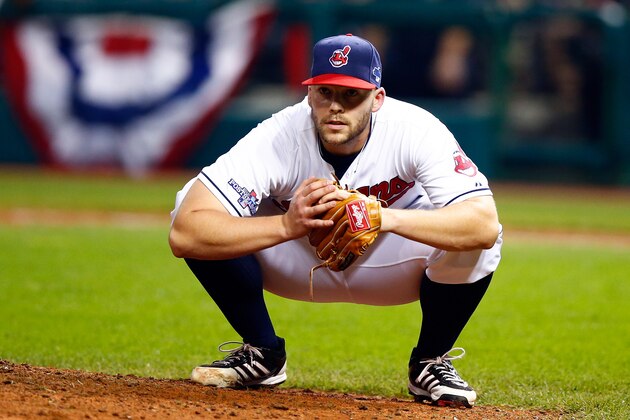 CLEVELAND, OH - OCTOBER 02:  Justin Masterson #63 of the Cleveland Indians ducks on a throw from third base to first base in the eighth inning against the Tampa Bay Rays during the American League Wild Card game at Progressive Field on October 2, 2013 in Cleveland, Ohio.  (Photo by Jared Wickerham/Getty Images)