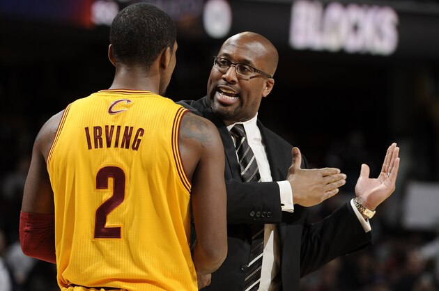 CLEVELAND, OH - DECEMBER 7:  Head coach Mike Brown of the Cleveland Cavaliers discusses the play with Kyrie Irving #2 during a break in the action against the Los Angeles Clippers at The Quicken Loans Arena on December 7, 2013 in Cleveland, Ohio. NOTE TO USER: User expressly acknowledges and agrees that, by downloading and/or using this Photograph, user is consenting to the terms and conditions of the Getty Images License Agreement. Mandatory Copyright Notice: Copyright 2013 NBAE (Photo by David Liam Kyle/NBAE via Getty Images)