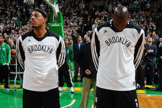 BOSTON, MA - JANUARY 26: Paul Pierce #34 and Kevin Garnett #2 of the Brooklyn Nets stand on the court during the national anthem before the game against the Boston Celtics on January 26, 2014 at the TD Garden in Boston, Massachusetts.  NOTE TO USER: User expressly acknowledges and agrees that, by downloading and or using this photograph, User is consenting to the terms and conditions of the Getty Images License Agreement. Mandatory Copyright Notice: Copyright 2014 NBAE  (Photo by Steve Babineau/NBAE via Getty Images)