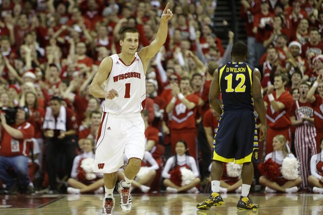 MILWAUKEE, WI - DECEMBER 07: Ben Brust #1 of the Wisconsin Badgers celebrates during the second half of play against the Marquette Golden Eagles at Kohl Center on December 07, 2013 in Madison, Wisconsin. (Photo by Mike McGinnis/Getty Images)
