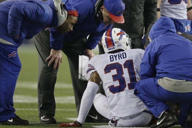 Buffalo Bills safety Jairus Byrd receives attention after an injury in the first quarter of an NFL football game against the New England Patriots Sunday, Dec. 29, 2013, in Foxborough, Mass. (AP Photo/Steven Senne)