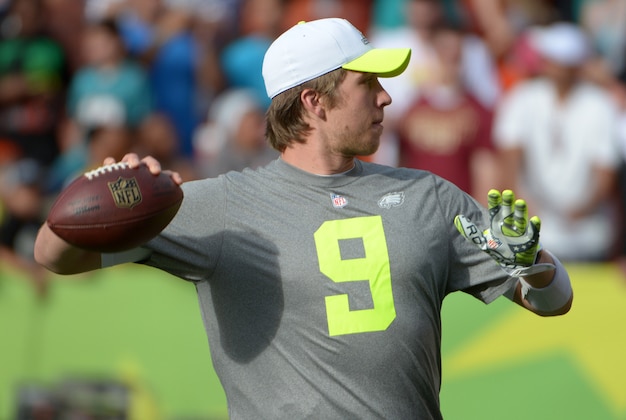 January 25, 2014; Honolulu, HI, USA; Philadelphia Eagles quarterback Nick Foles (9) throws a pass during the 2014 Pro Bowl Ohana Day at Aloha Stadium. Mandatory Credit: Kirby Lee-USA TODAY Sports