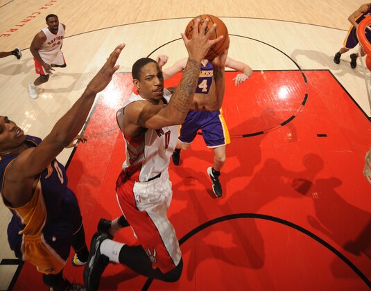 TORONTO, CANADA - January 19: DeMar DeRozan #10 of the Toronto Raptors goes up for the layup against the Los Angeles Lakers during the game on January 19, 2014 at the Air Canada Centre in Toronto, Ontario, Canada. NOTE TO USER: User expressly acknowledges and agrees that, by downloading and or using this Photograph, user is consenting to the terms and conditions of the Getty Images License Agreement. Mandatory Copyright Notice: Copyright 2014 NBAE (Photo by Ron Turenne/NBAE via Getty Images) TORONTO, CANADA - January 19: DeMar DeRozan #10 of the Toronto Raptors goes up for the layup against the Los Angeles Lakers during the game on January 19, 2014 at the Air Canada Centre in Toronto, Ontario, Canada. NOTE TO USER: User expressly acknowledges and agrees that, by downloading and or using this Photograph, user is consenting to the terms and conditions of the Getty Images License Agreement. Mandatory Copyright Notice: Copyright 2014 NBAE (Photo by Ron Turenne/NBAE via Getty Images)