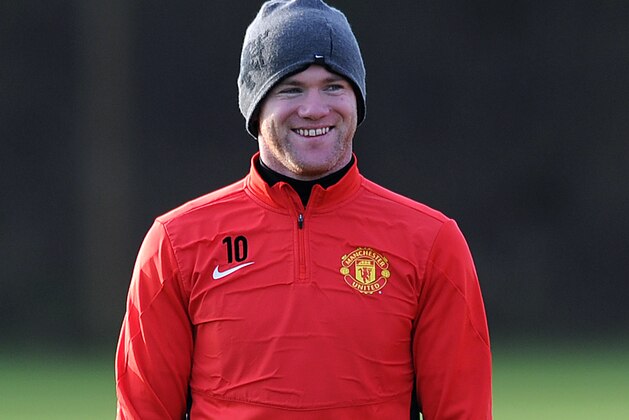 MANCHESTER, ENGLAND - DECEMBER 09: Wayne Rooney of Manchester United looks on during a first team training session, ahead of their UEFA Champions League Group A match against Shakhtar Donetsk, at Aon Training Complex on December 09, 2013 in Manchester, England. (Photo by Chris Brunskill/Getty Images)