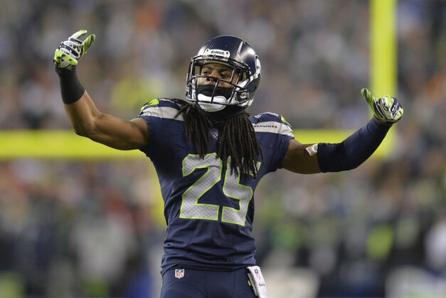 Jan 19, 2014; Seattle, WA, USA; Seattle Seahawks cornerback Richard Sherman (25) celebrates during the second half of the 2013 NFC Championship football game at CenturyLink Field. The Seahawks defeated the 49ers 23-17. Mandatory Credit: Steven Bisig-USA TODAY Sports