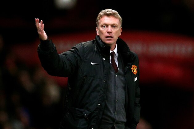 MANCHESTER, ENGLAND - JANUARY 22:  David Moyes the Manchester United manager reacts during the Capital One Cup semi final, second leg match between Manchester United and Sunderland at Old Trafford on January 22, 2014 in Manchester, England.  (Photo by Clive Mason/Getty Images)