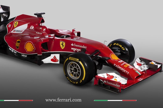 In this photo made available by Ferrari Media Saturday, Jan. 25, 2014, the new Ferrari F14 T Formula One car presented in Maranello, Italy. Ferrari unveiled its 2014 Formula One car Saturday in an online presentation, showing off a new paint job featuring a black outline of the familiar red coloring. The F14 T, Ferrari's 60th Formula One car, features a thin nose with an open front that curves down to the front wing. Its name was selected following an online vote with more than a million responses. (AP Photo/Ferrari Photoservice)
