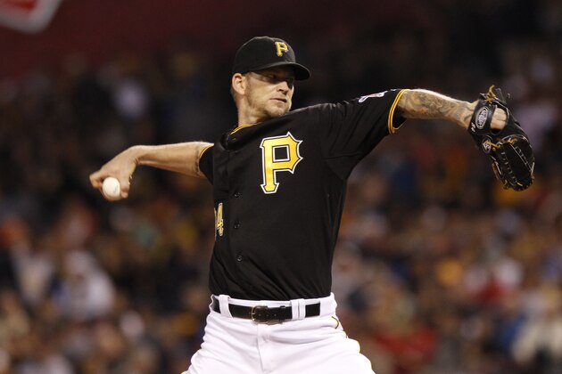 PITTSBURGH, PA - SEPTEMBER 21: A.J. Burnett #34 of the Pittsburgh Pirates pitches against the Cincinnati Reds during the second inning of their game on September 21, 2013 at PNC Park in Pittsburgh Pennsylvania. The Pirates defeated the Reds 4-2. (Photo by David Maxwell/Getty Images)