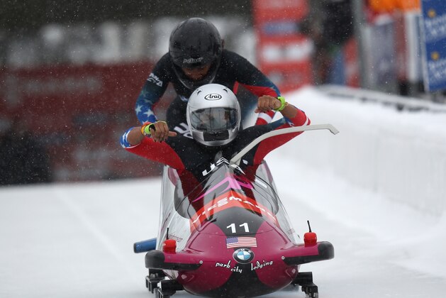 The United States' Jazmine Fenlator, front, and Lauryn Williams compete during the women's bobsledding World Cup event Saturday, Dec. 7, 2013, in Park City, Utah. Fenlator and Williams tied for second place.  (AP Photo/Rick Bowmer)