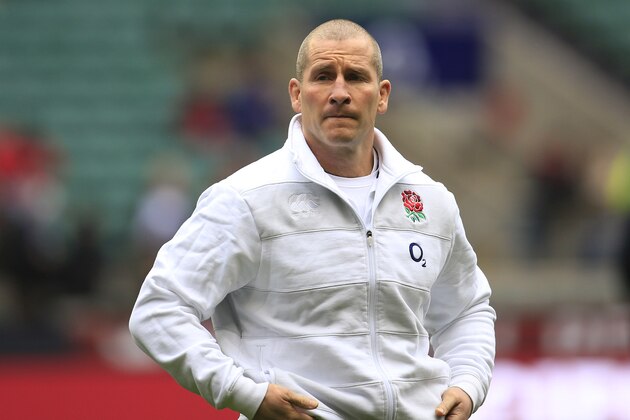 England's head coach Stuart Lancaster watches his team warm up before the start of their Six Nations rugby union match against Italy at Twickenham Stadium in London, Sunday, March 10, 2013. (AP Photo/Sang Tan)